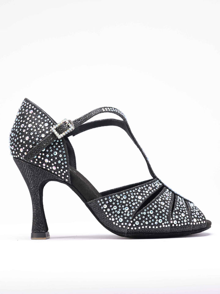 Zapatos de baile latino et salsa para mujer, modèle Estelle, design T-strap orné de pedrería scintillants, y compris sur la boucle, forme avant étroite avec ouvertures, talon rétro de 8,5 cm, couleur negroe - vue de côté