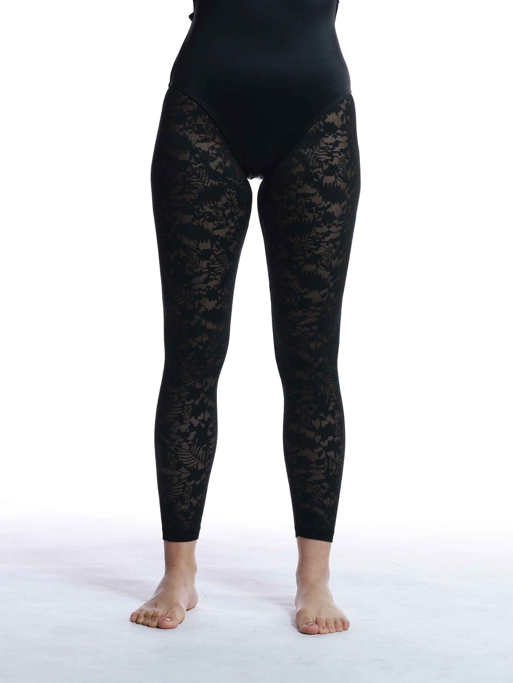 Détail du motif floral en encaje des medias para mujer - design raffiné
