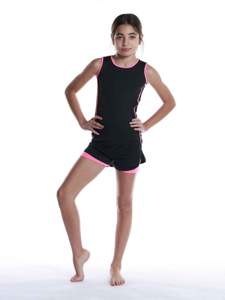 Ensemble de sport perforé negro y rosa vif para niñas - vue de face con haut court y short