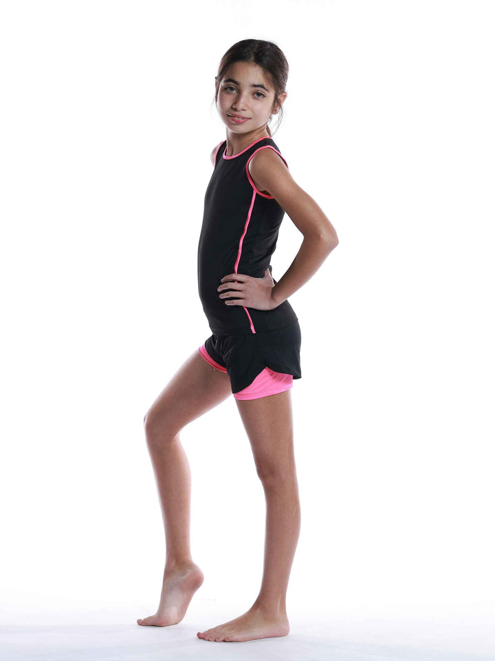 Ensemble de sport perforé negro et rosa vif para niñas - vue de profil montrant les détails perforés
