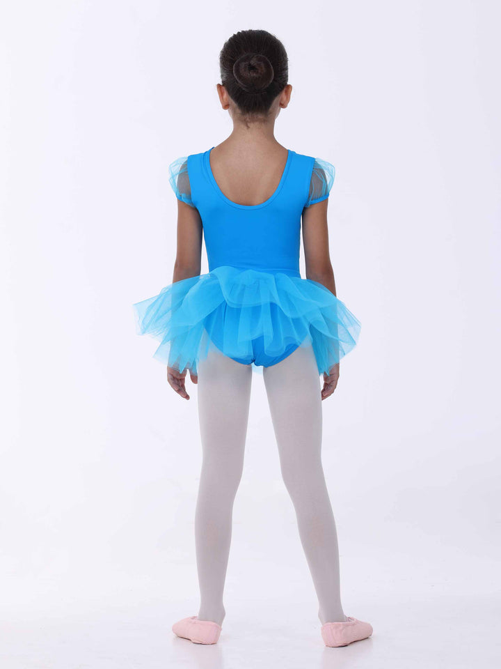 Abito tutu blu clair da bambina – dos arrondi e superposition di tulle volumineux.