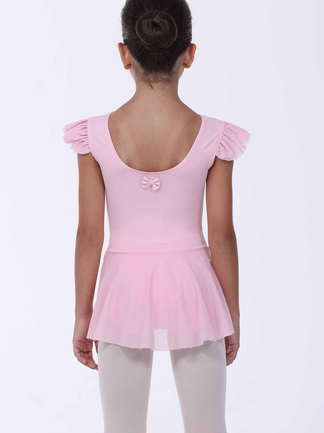 Vue de dos d’une vestido de danse rosa clair para niña – nœud décoratif y falda fluido.