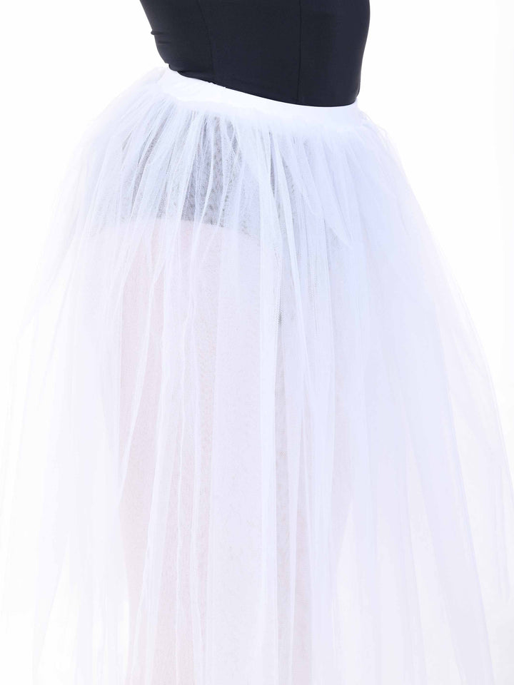 Détail du tutu romantique blanco en tul – falda longue y légère idéale para la ballet.